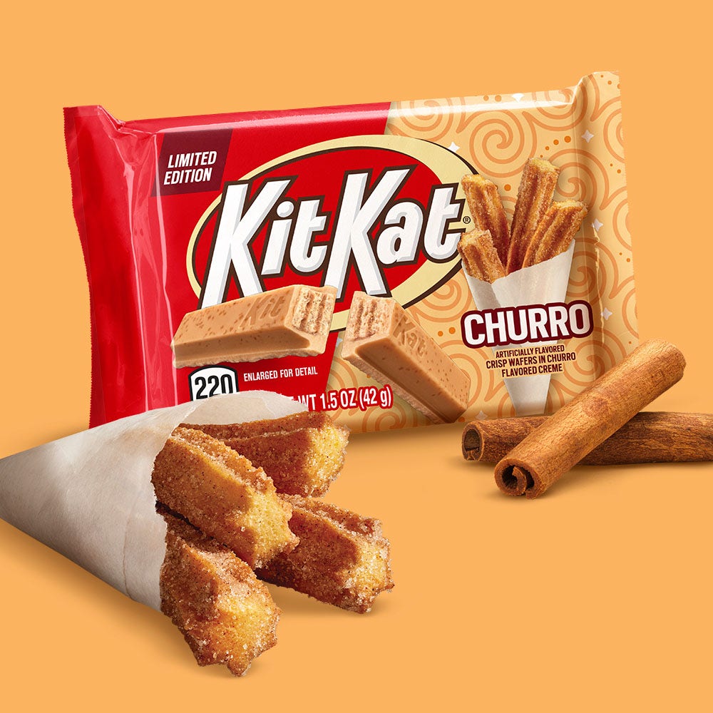 kit kat churro candy bar beside churros and cinnamon sticks